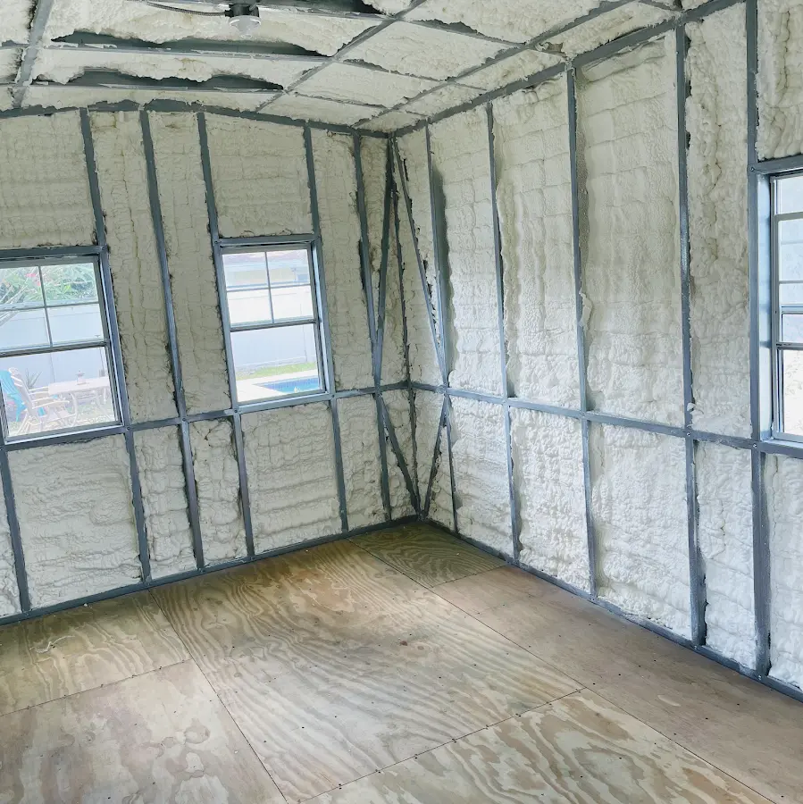Closed-cell spray foam insulation applied to wall cavities in a residential project in Arkansas City